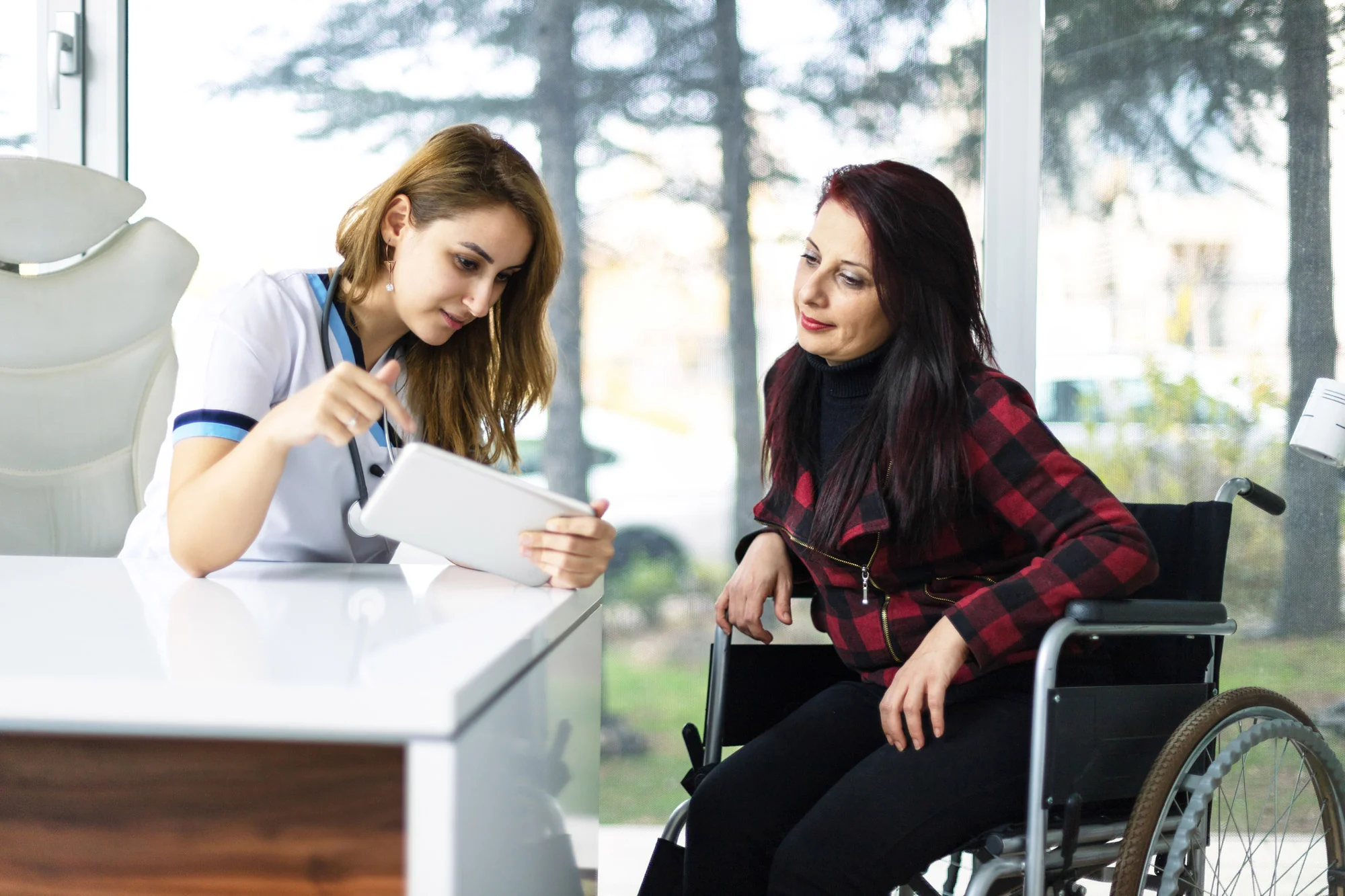 Specialist Support Coordinator assisting an NDIS participant with complex disability support services in Australia.