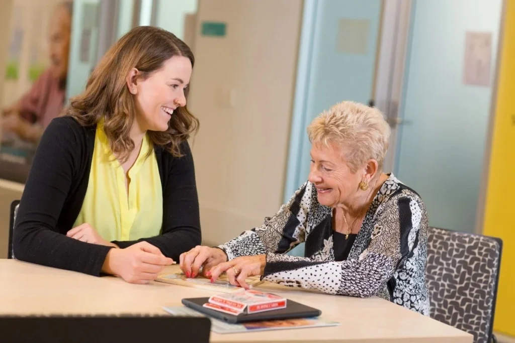 Elderly woman receiving support from caregiver at home – Private Home Care Services, Iconic Care Group Australia, Campbelltown NSW